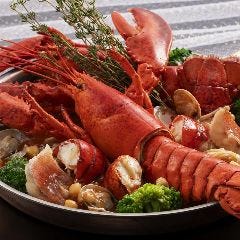 オマール海老と白身魚と浅利のパプリカ香るスープ仕立て