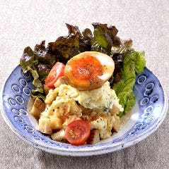 虎連坊 ヒルトンプラザウエスト店_いぶりがっこと煮玉子のポテトサラダ
