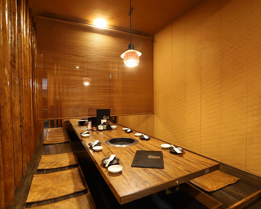 木の温もりが感じられるいが本舗 センター北店の半個室