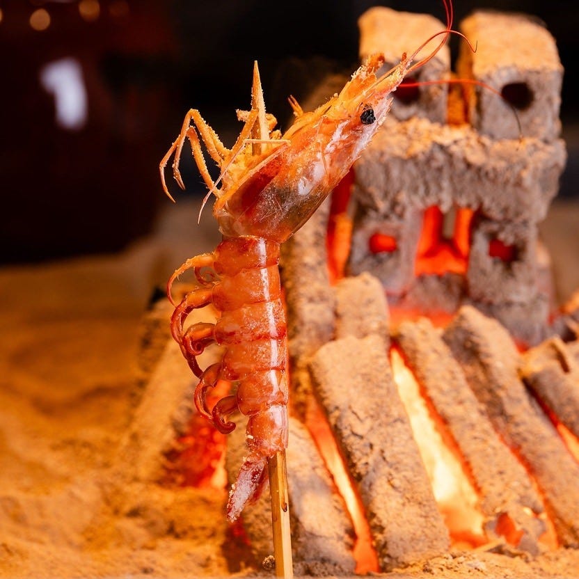 炭火焼き リリー 渋谷店の海老の原始焼コースの料理イメージ