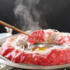 独自の金柑出汁を使用した肉炊き鍋