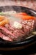 お肉は熱した鉄板でご提供しています。お好みの焼き加減でどうぞ