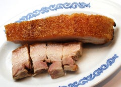 <皮付き豚バラ肉の焼物> ※200gより計量販売します。