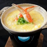 カニ味噌雑炊　※系列店の料理一例です。