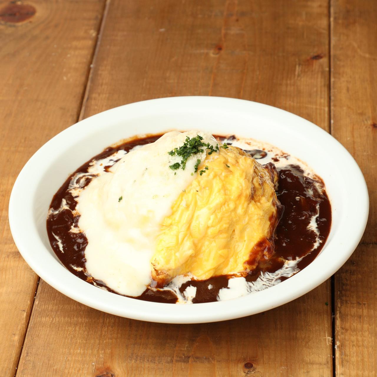 ナンバー ハチマルニ カフェ アンド ダイナー シブヤテンのフォンデュソースとデミグラスのとろとろオムライス