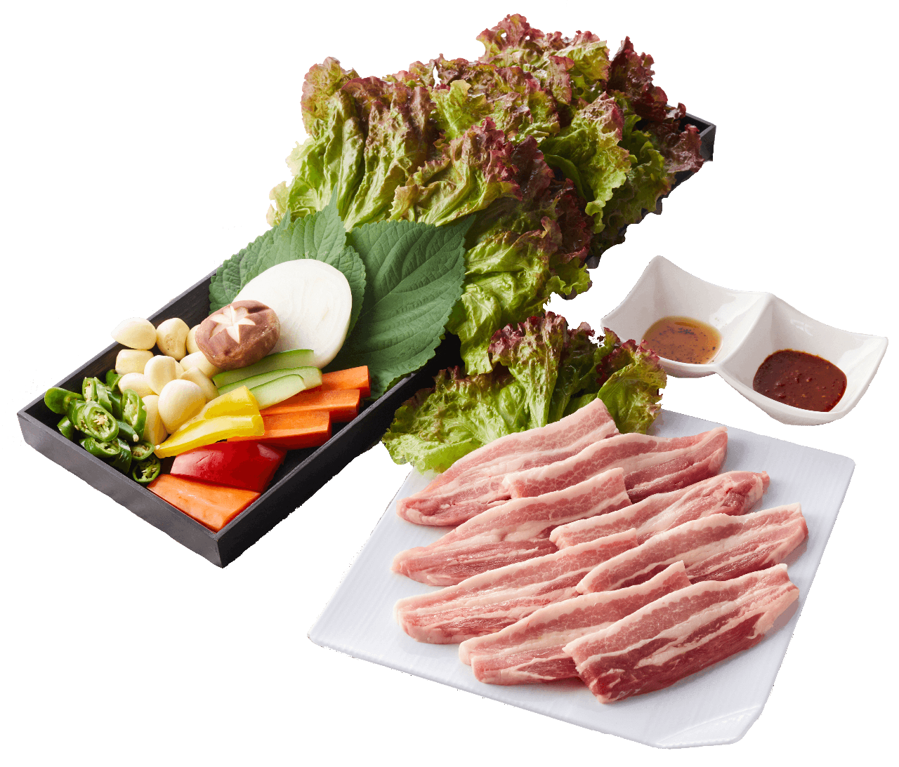 カリカリに焼き上げた鹿児島県産豚肉を、新鮮な生野菜とご一緒に