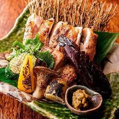 銀座 独楽_つくば鶏のもも 柚子胡椒炭火焼き