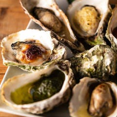 日本酒と海鮮 痛風屋 新宿歌舞伎町店_焼き牡蠣2個セット