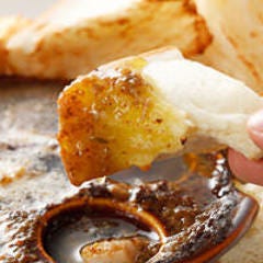 たこのエスカルゴ風バター焼 パンにたっぷりのソースをつけて♪