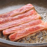 黒毛和牛サーロインステーキと生アワビバター焼きピザと創作海鮮料理コース。